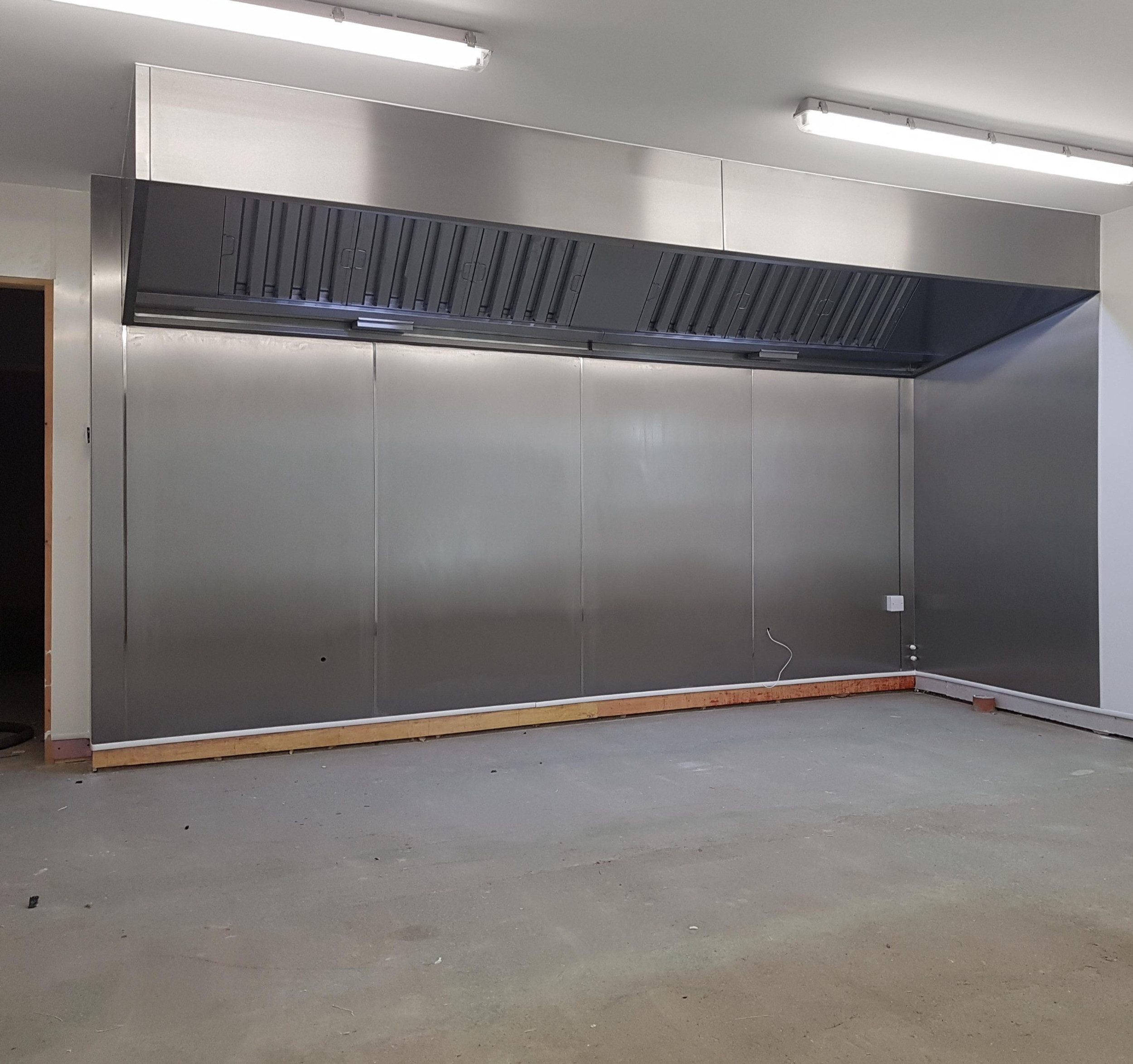 Kitchen canopy installation in progress